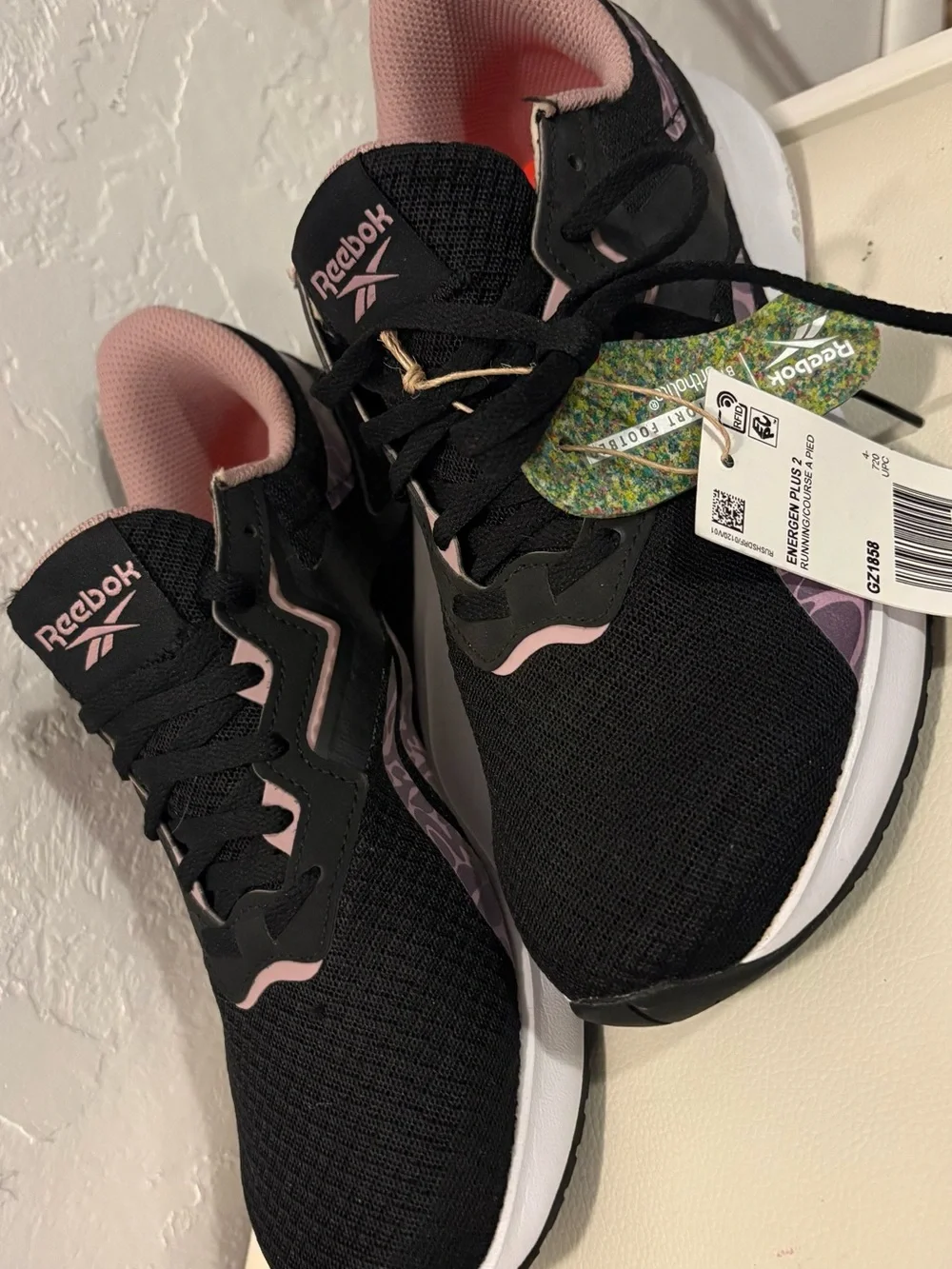 Reebok Black Shoe with Lilac Collar and Orange Insole